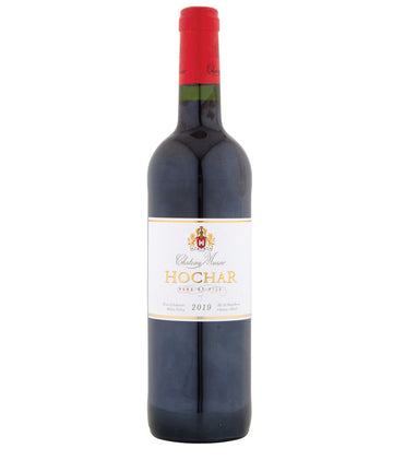 A bottle of Chateau Musar Hochar Père et Fils 2019 red wine. The bottle has a red foil capsule and a white label with gold and black text. The label features a crest at the top, the name 'Chateau Musar' in cursive, 'HOCHAR' in bold gold letters, and 'Père et Fils' beneath in red. The wine is from the Bekaa Valley in Lebanon.