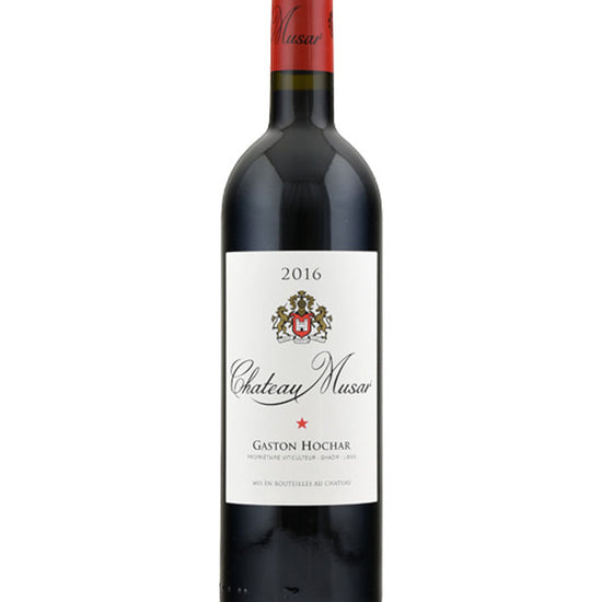 Bottle of Chateau Musar Red 2016 wine with red foil capsule and cream label featuring the winery crest and the name Gaston Hochar.