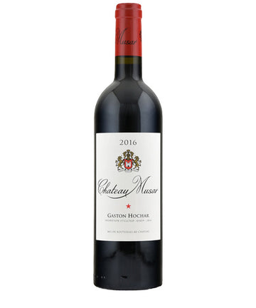 Bottle of Chateau Musar Red 2016 wine with red foil capsule and cream label featuring the winery crest and the name Gaston Hochar.