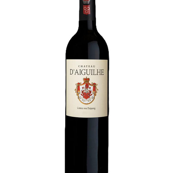 Bottle of Château d'Aiguilhe 2012 red wine from Castillon Côtes de Bordeaux with detailed label and crest