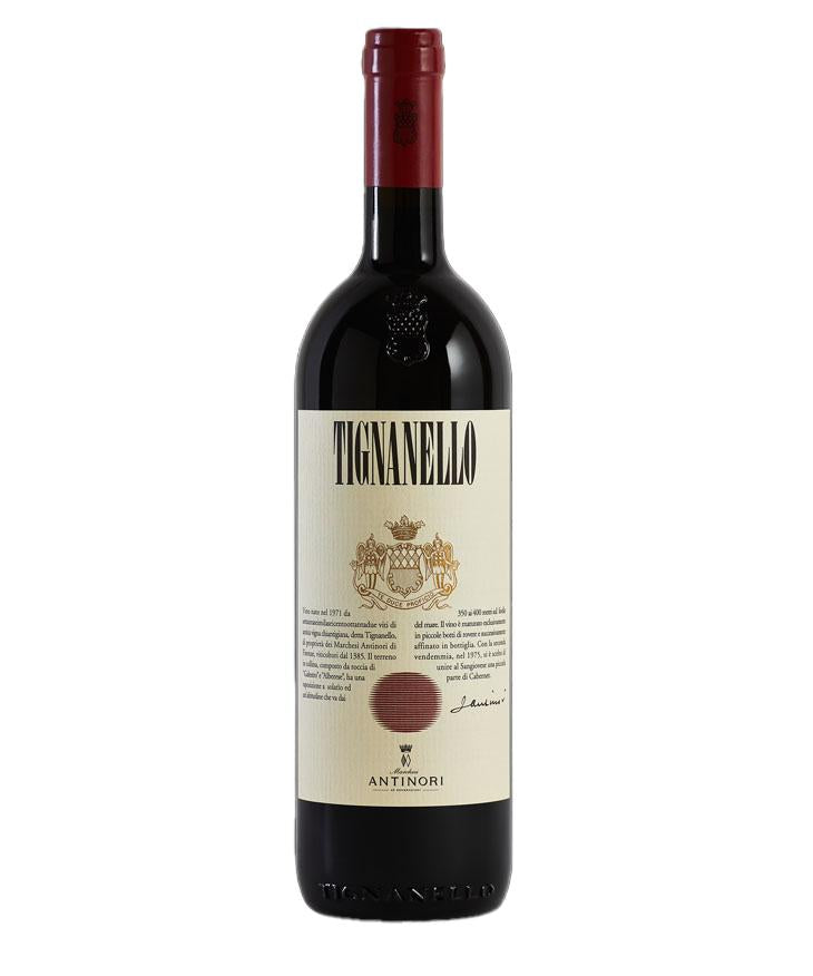 Red wine bottle with Tignanello label on a white background