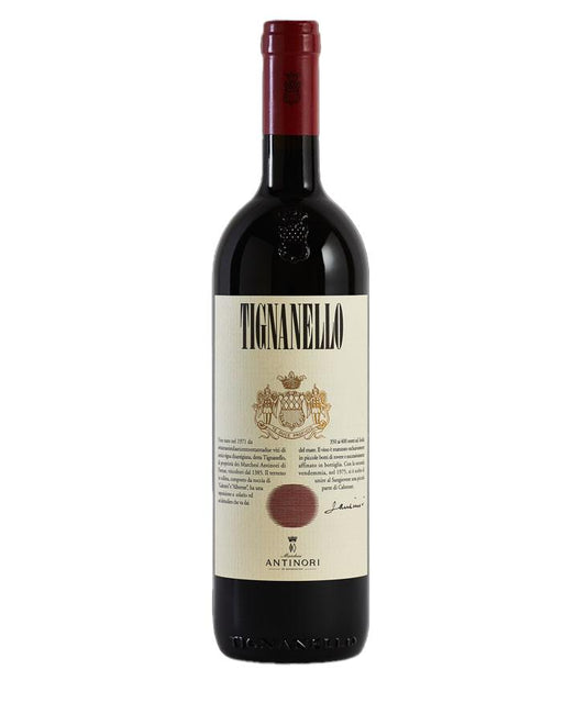 Red wine bottle with Tignanello label on a white background