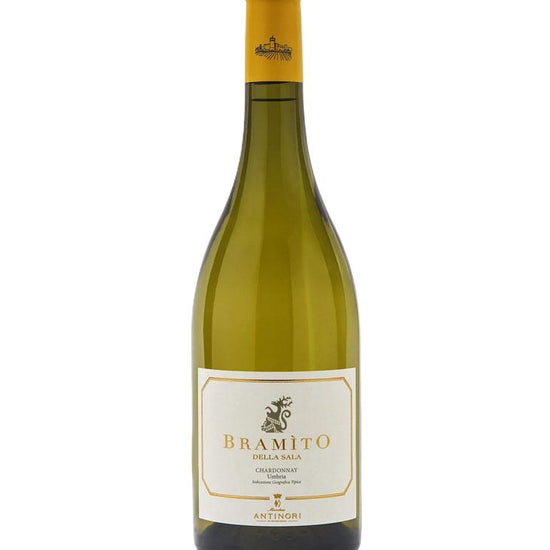 Wine bottle with yellow label on a white background
