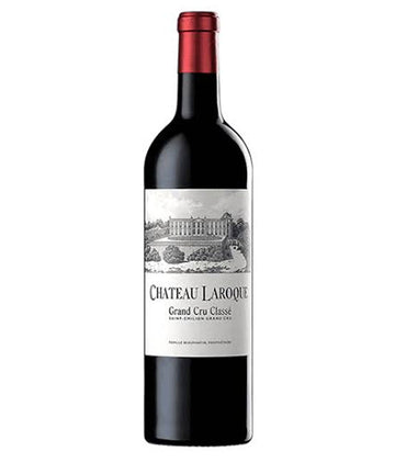 A bottle of Chateau Laroque Grand Cru Classique red wine, featuring a dark glass bottle with a red foil capsule and a white label depicting a chateau illustration.