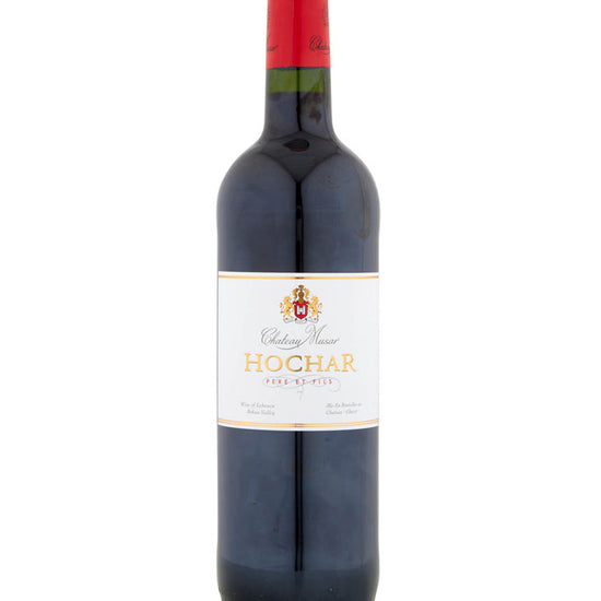 Red wine bottle with a red cap and visible label on a white background