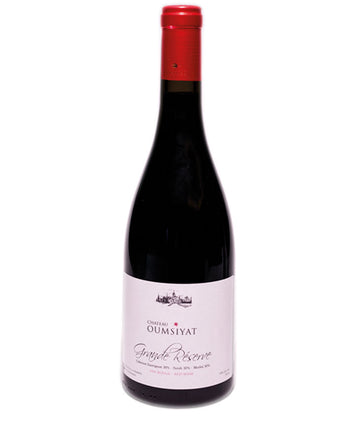 Wine bottle with red cap and white label on a white background