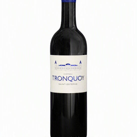 A bottle of Château de Tronquoy Saint-Estèphe red wine, featuring a dark glass bottle with a cream-colored label and a blue foil cap, set against a plain light gray background.