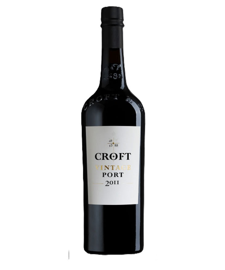 A bottle of Croft Vintage Port 2011, featuring a dark glass bottle with a white label and gold lettering, set against a plain white background.