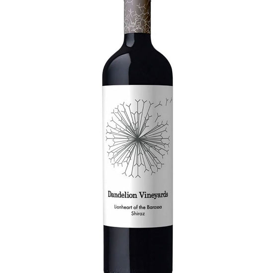 Wine bottle with a white label featuring a geometric design on a white background