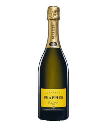 A bottle of Drappier Creme d'Or Champagne, featuring a dark brown glass bottle, a gold foil neck wrap, and a prominent gold label on the front.