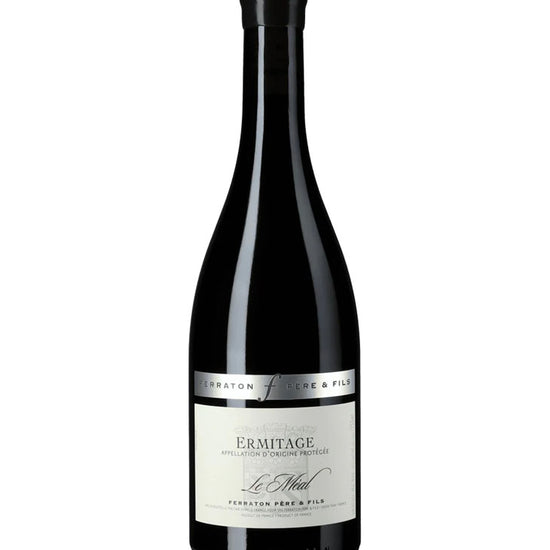 Wine bottle with label on a white background