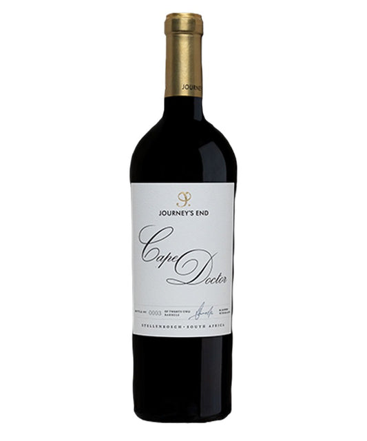 A bottle of Journey's End Cape Doctor red wine, featuring a dark glass bottle with a gold foil capsule and a white label with elegant black script.