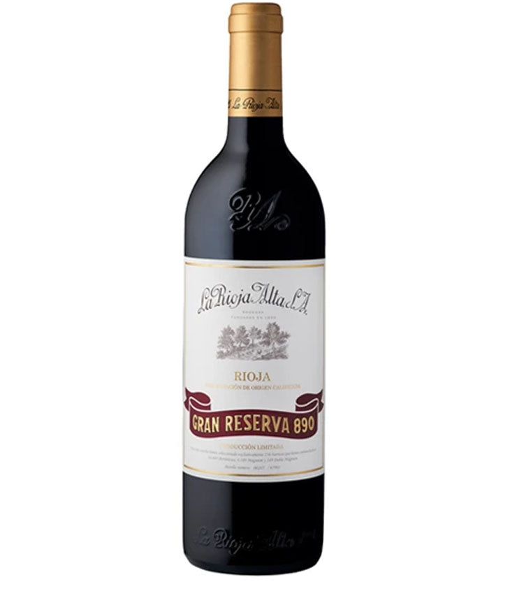 Wine bottle with a gold foil cap and white label on a white background