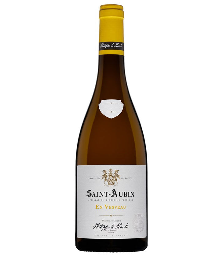 Wine bottle with yellow cap and white label on a white background