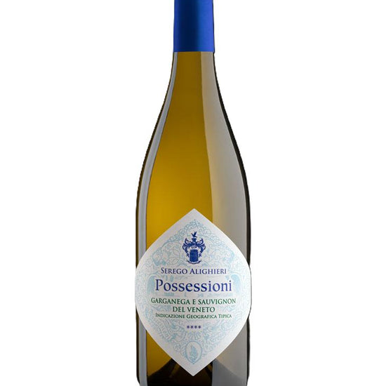 Wine bottle with blue cap and white label on a white background