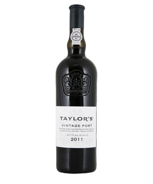 A bottle of Taylor's Vintage Port 2011 wine, featuring a dark glass bottle with a black capsule and a white label, set against a plain white background.