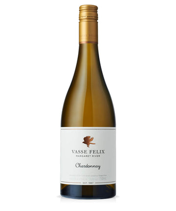 A bottle of Vasse Felix Margaret River Chardonnay white wine, featuring a gold foil-wrapped neck, a dark green glass bottle, and a white label with a brown bird logo.