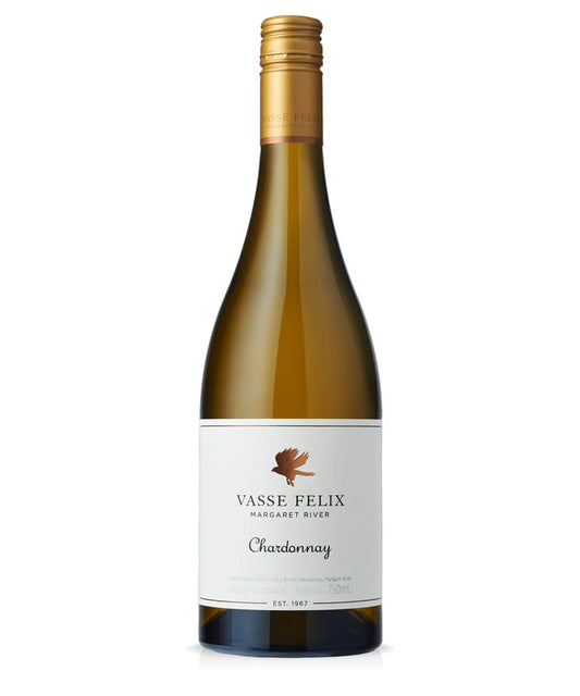 A bottle of Vasse Felix Margaret River Chardonnay white wine, featuring a gold foil-wrapped neck, a dark green glass bottle, and a white label with a brown bird logo.